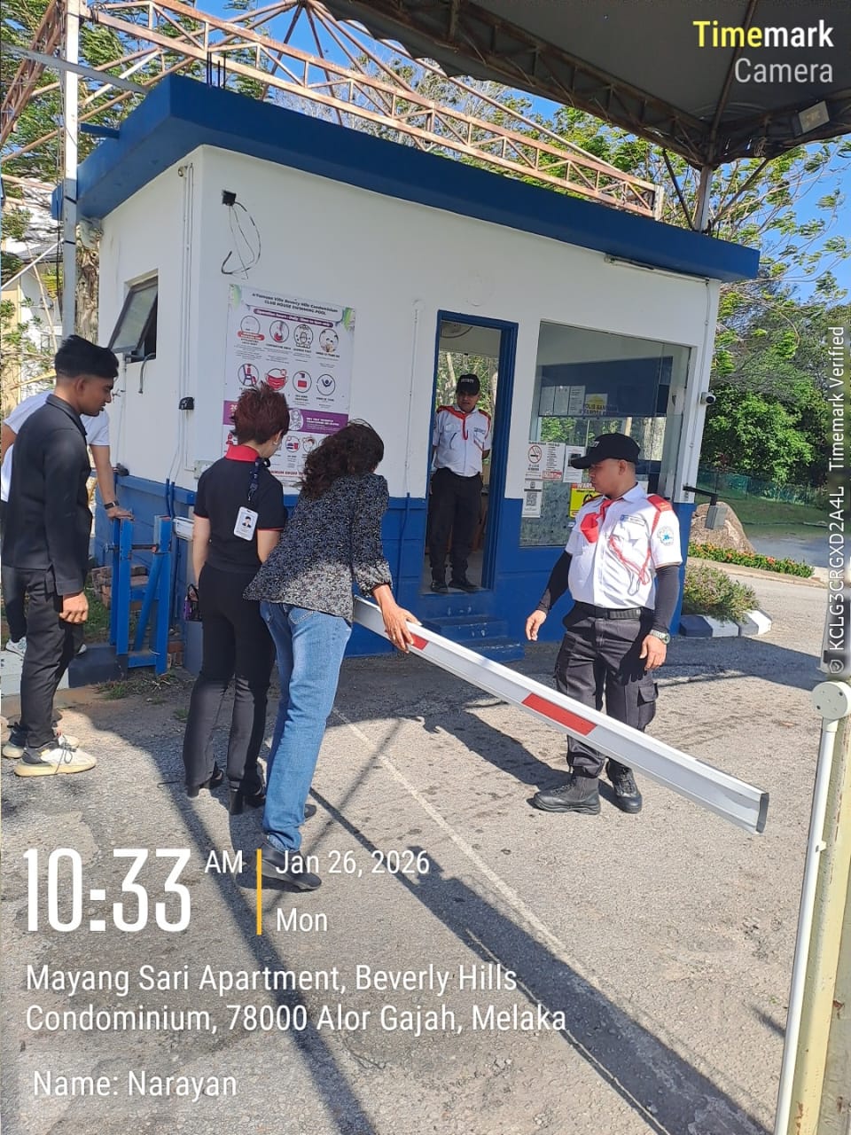 KSD Security guard operating the boom gate at the guardhouse of Mayang Sari Apartment, Beverly Hills Condominium in Alor Gajah, Melaka.
